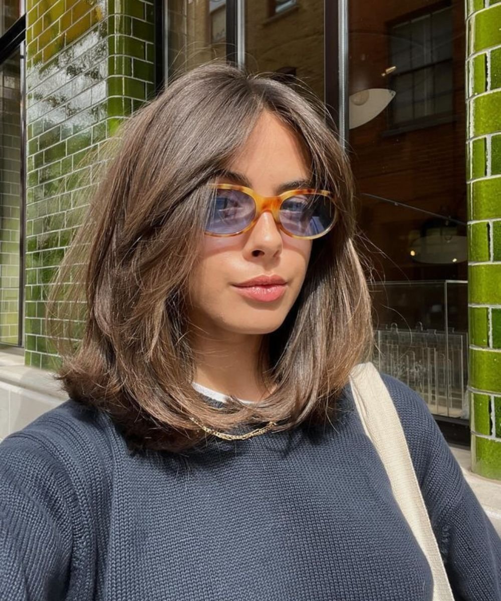 Dicas de styling para valorizar seu corte de cabelo volumoso