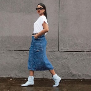 Looks estilosos com saia midi e bota para trabalhar