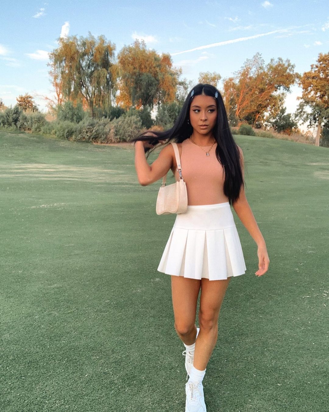 looks casuais com saia de pregas