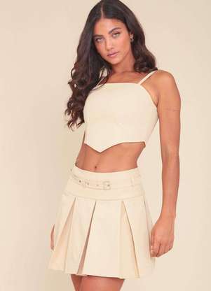 Como escolher a saia de pregas ideal para seu corpo